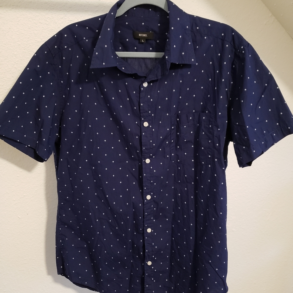 Patterned navy short-sleeved button up.